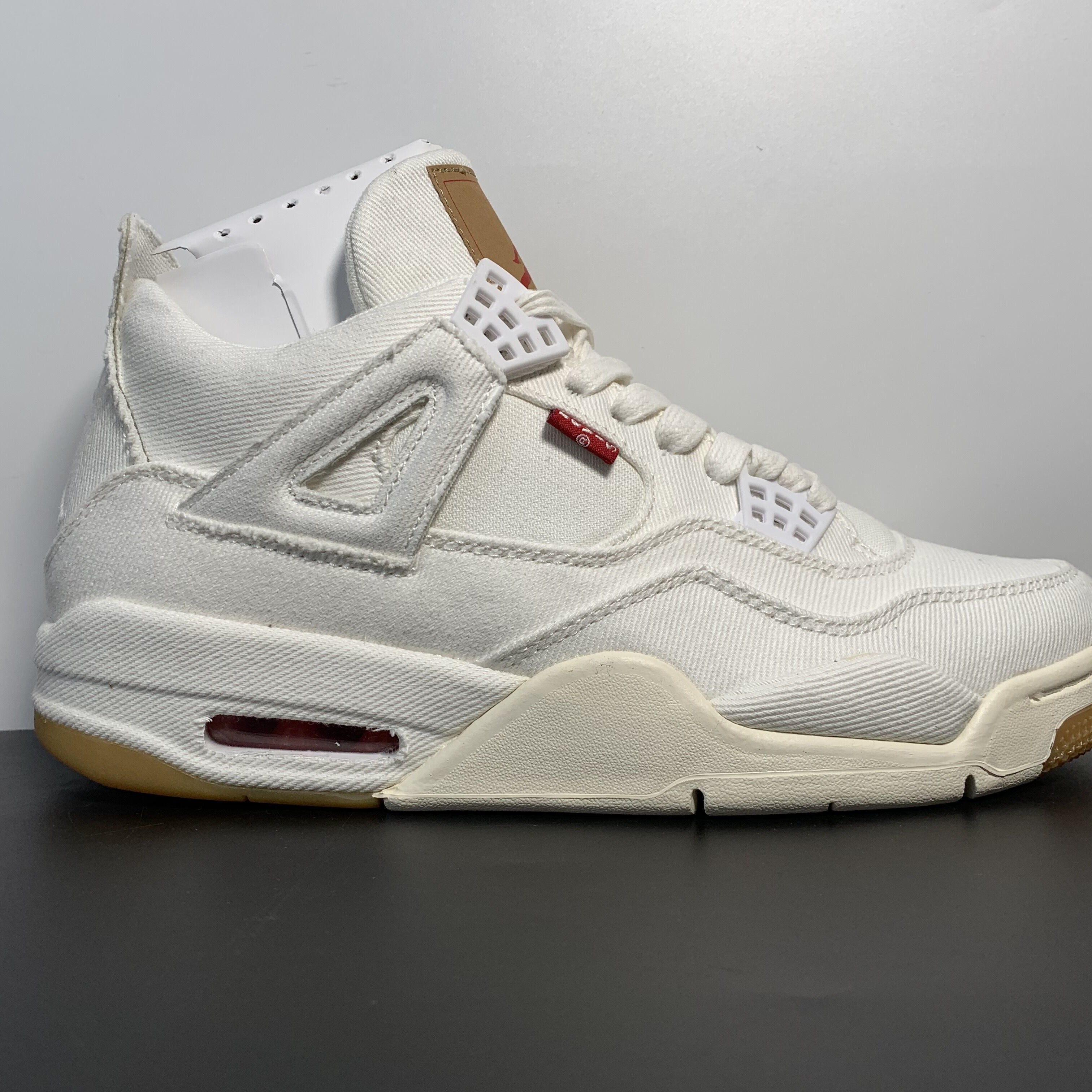 Levi's x Air Jordan 4 Retro "White Denim"