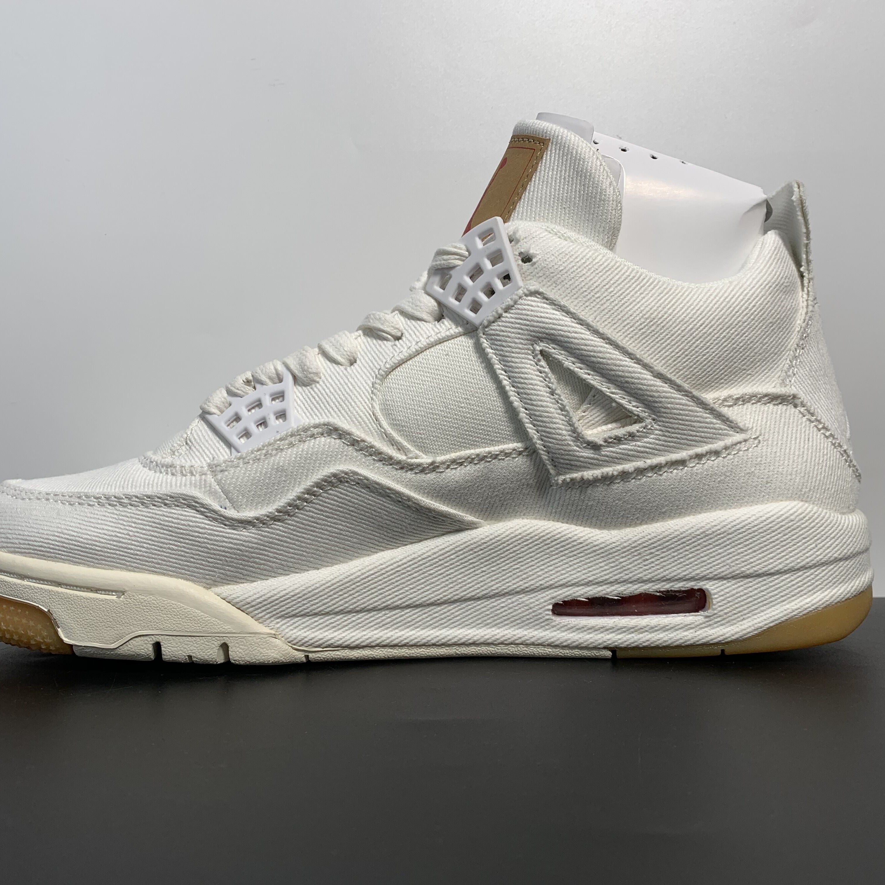 Levi's x Air Jordan 4 Retro "White Denim"