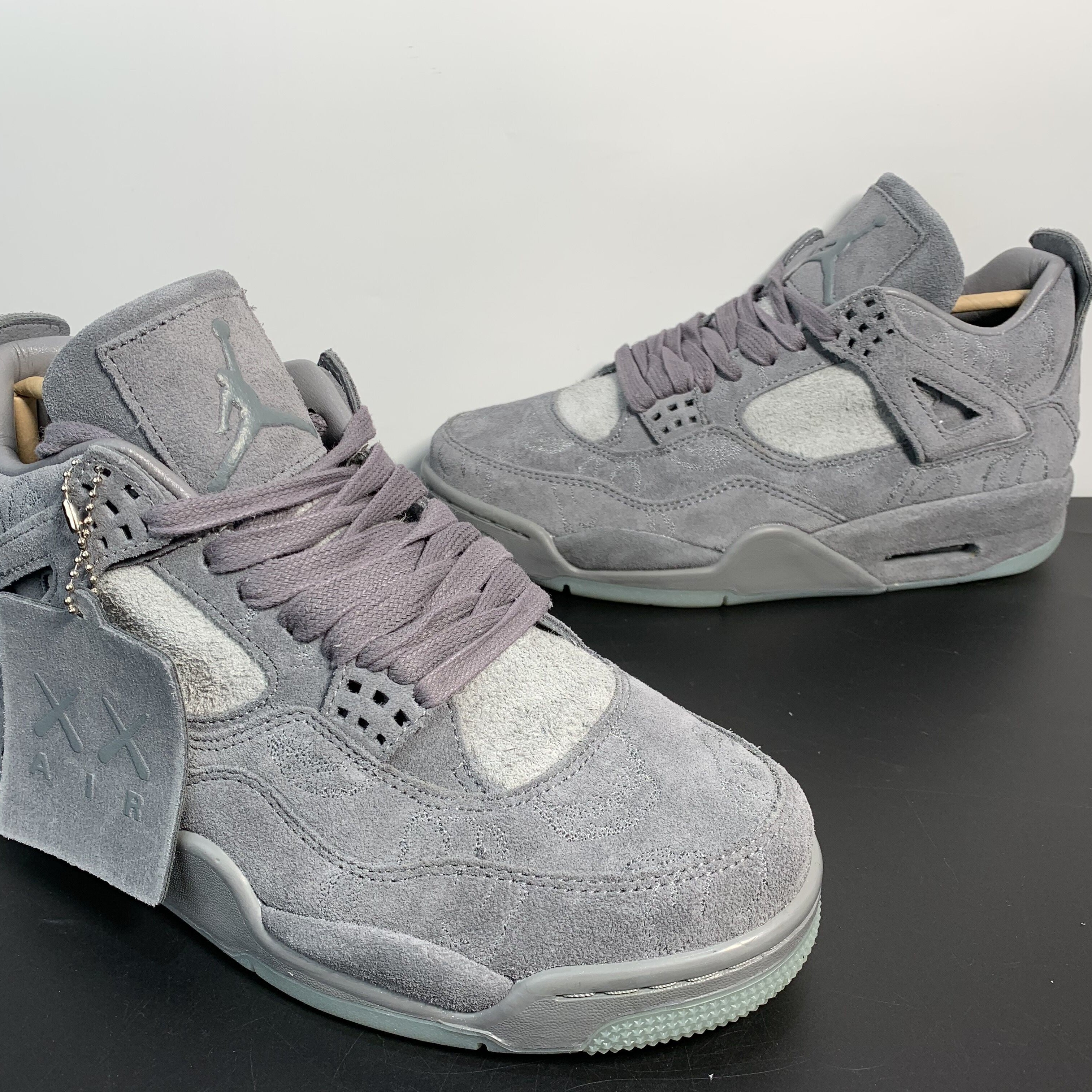Air Jordan 4 Retro x KAWS "Cool Grey"