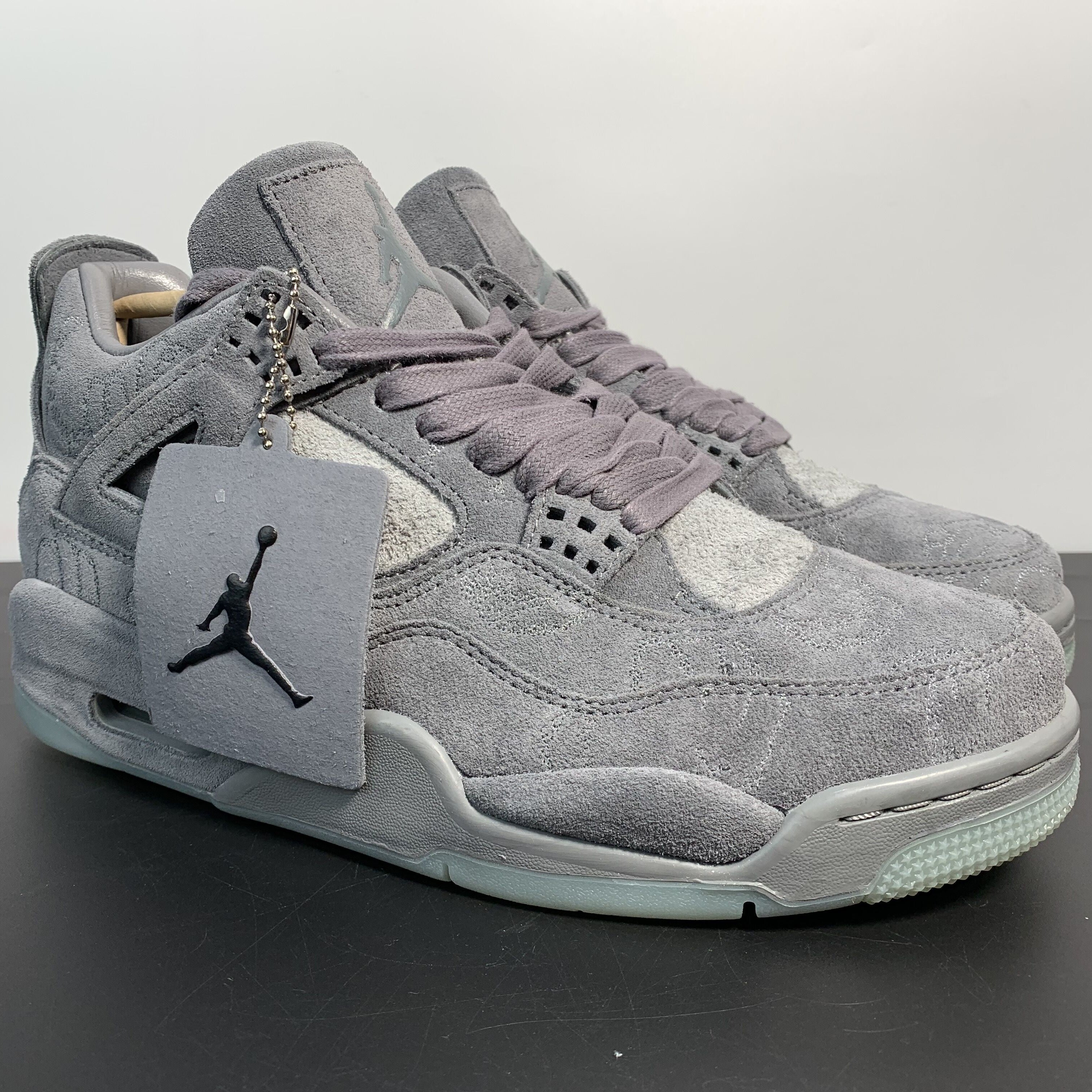 Air Jordan 4 Retro x KAWS "Cool Grey"