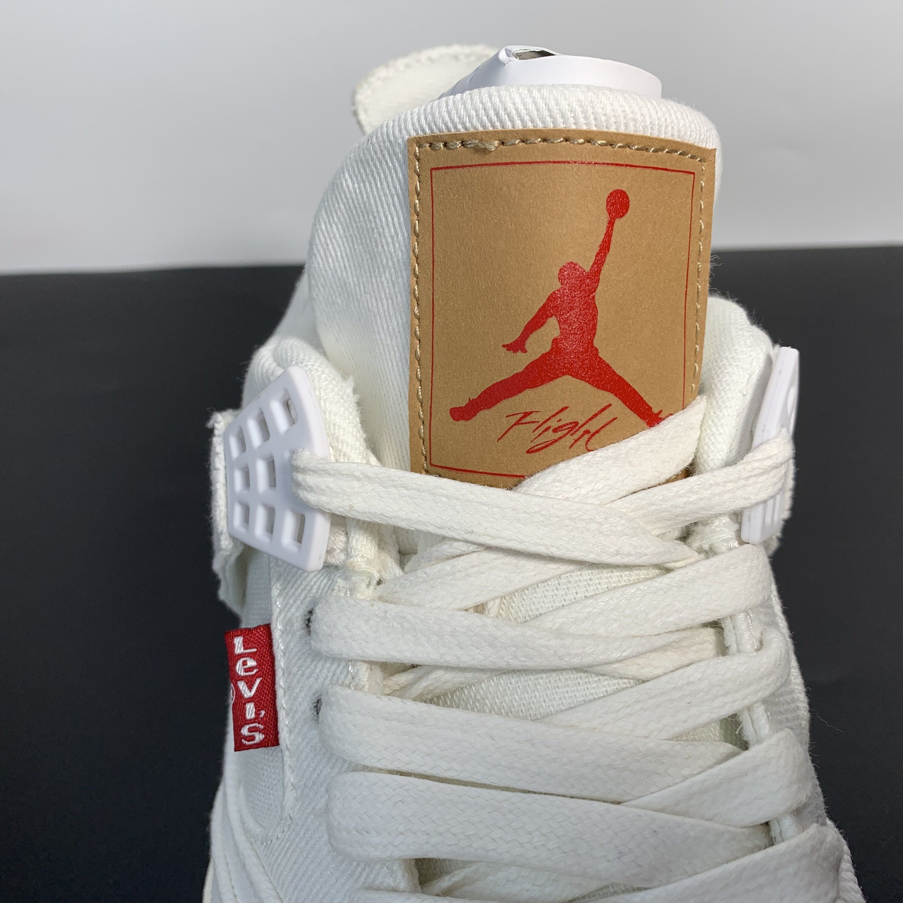 Levi's x Air Jordan 4 Retro "White Denim"