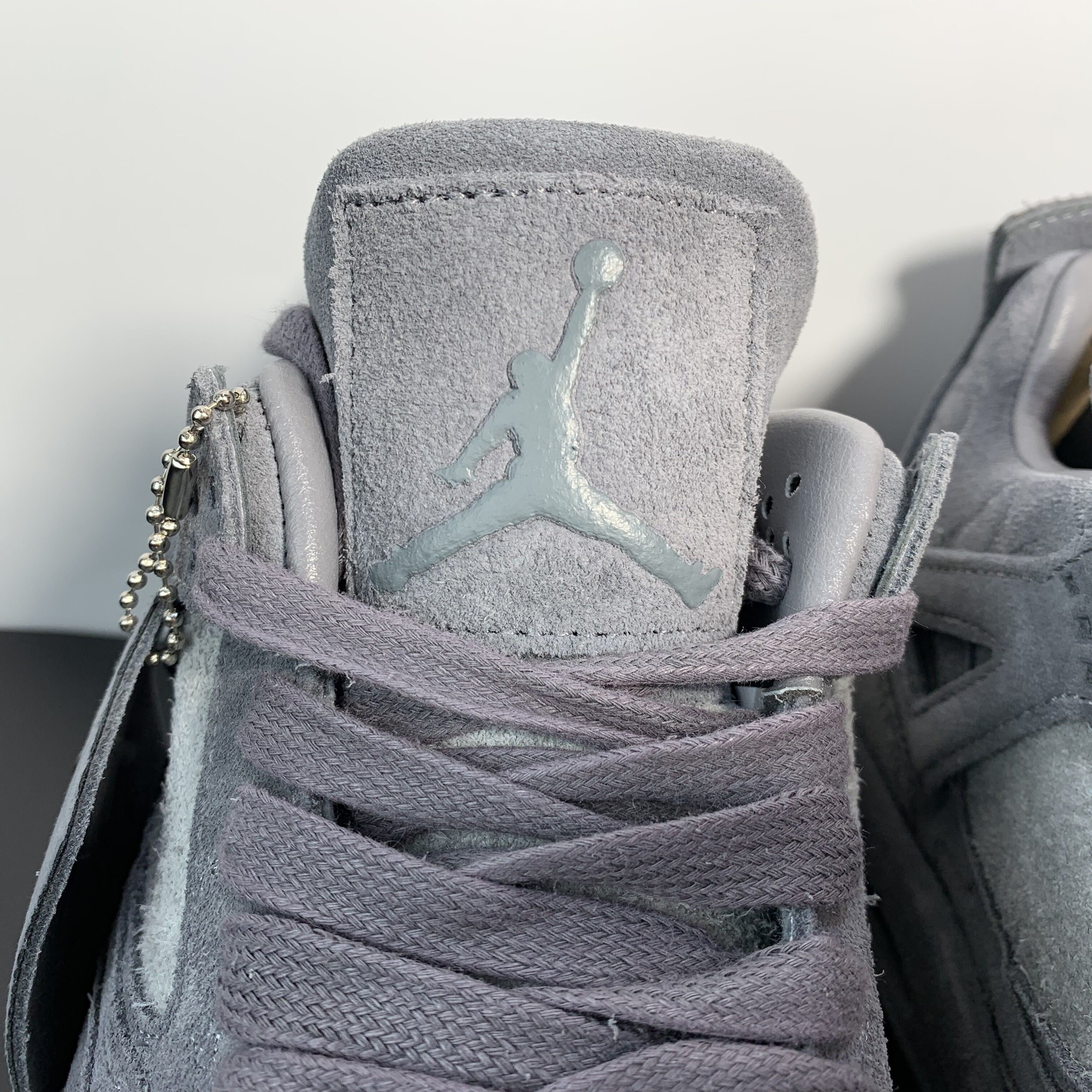 Air Jordan 4 Retro x KAWS "Cool Grey"