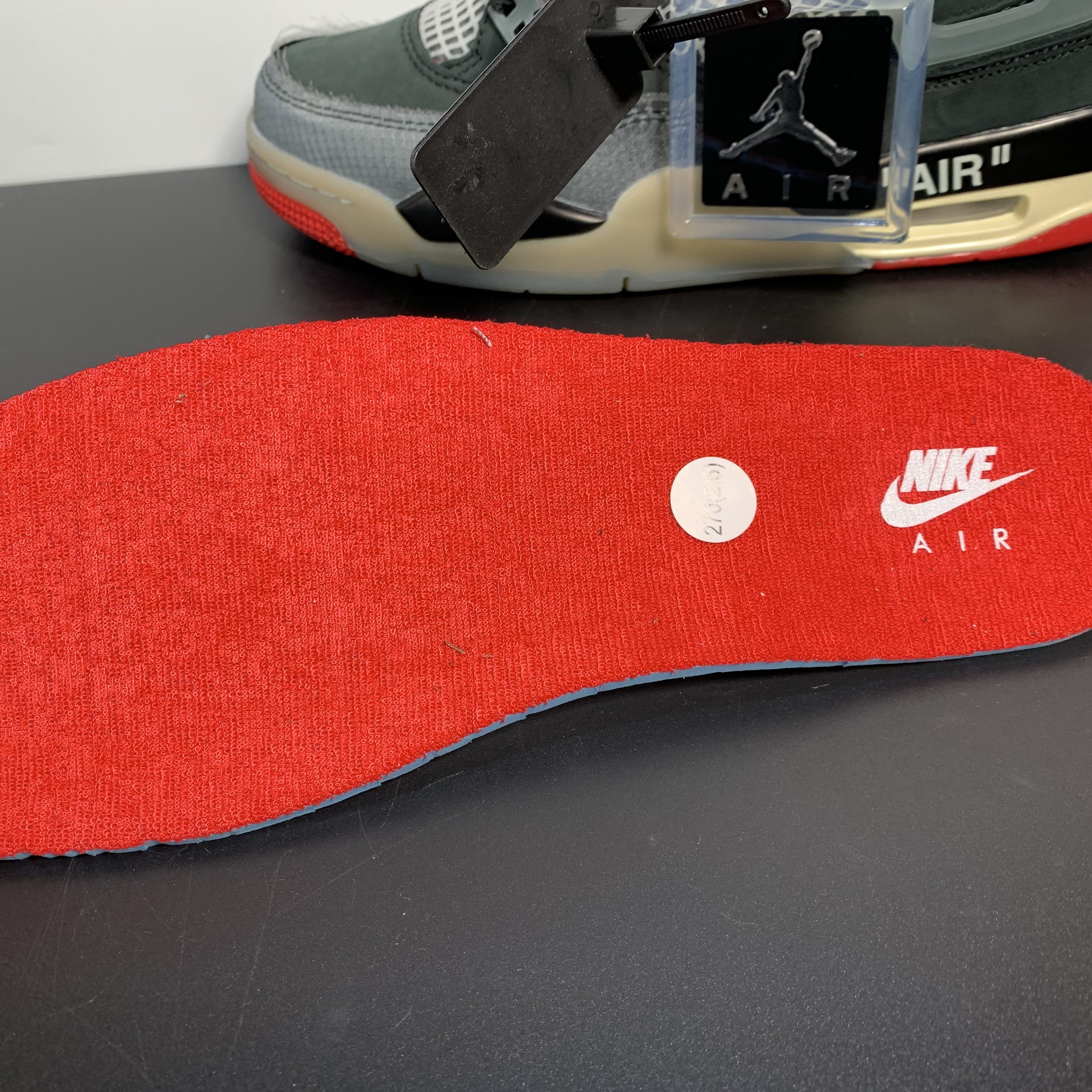 Off-White x Air Jordan 4 Retro "Bred"
