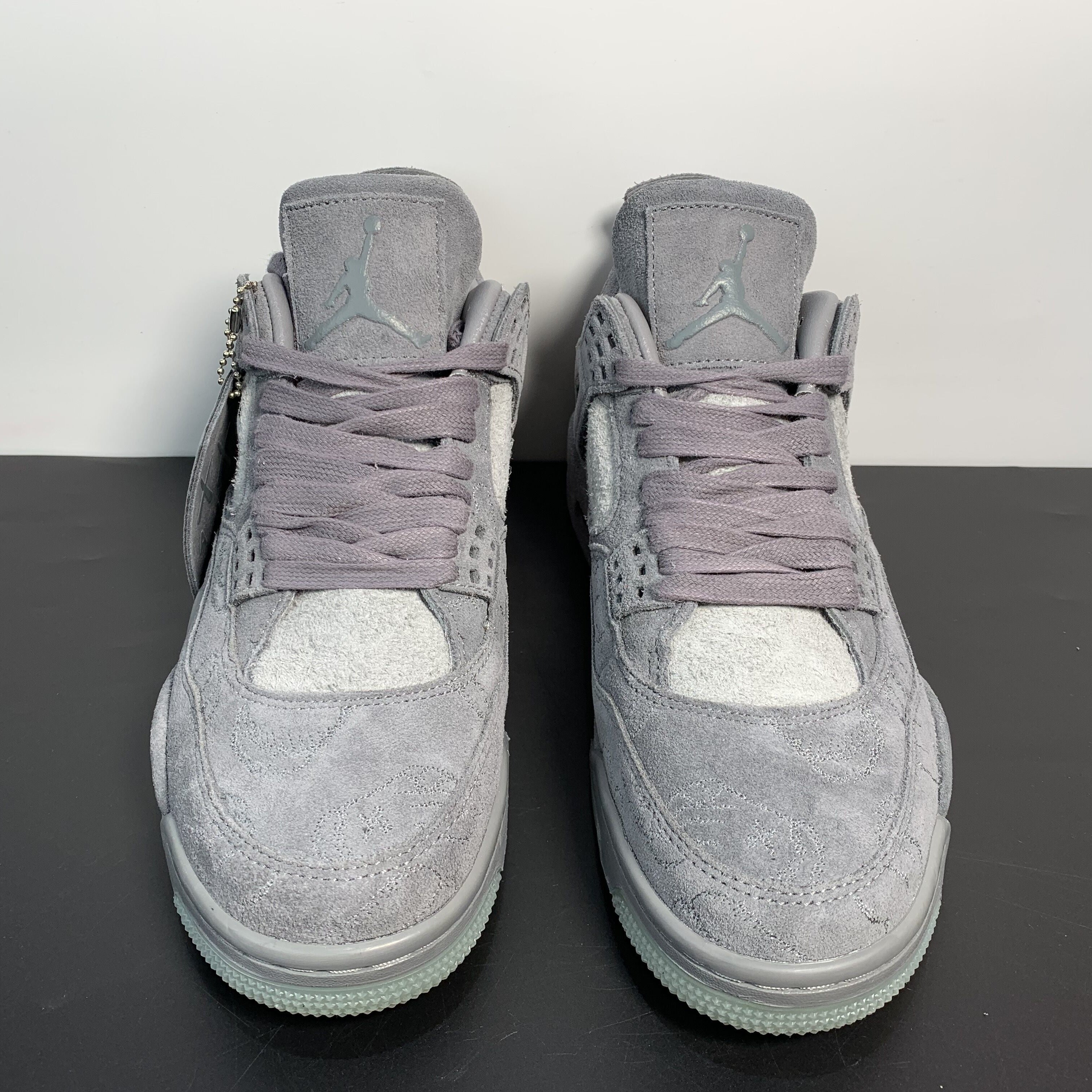Air Jordan 4 Retro x KAWS "Cool Grey"