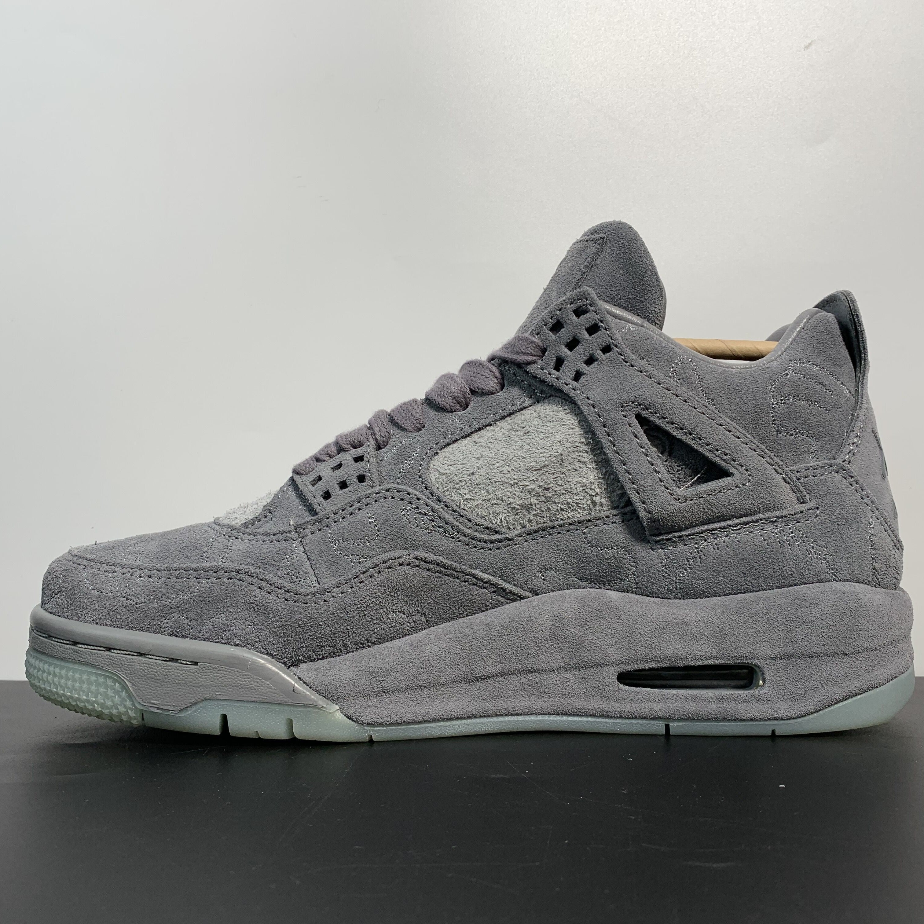 Air Jordan 4 Retro x KAWS "Cool Grey"