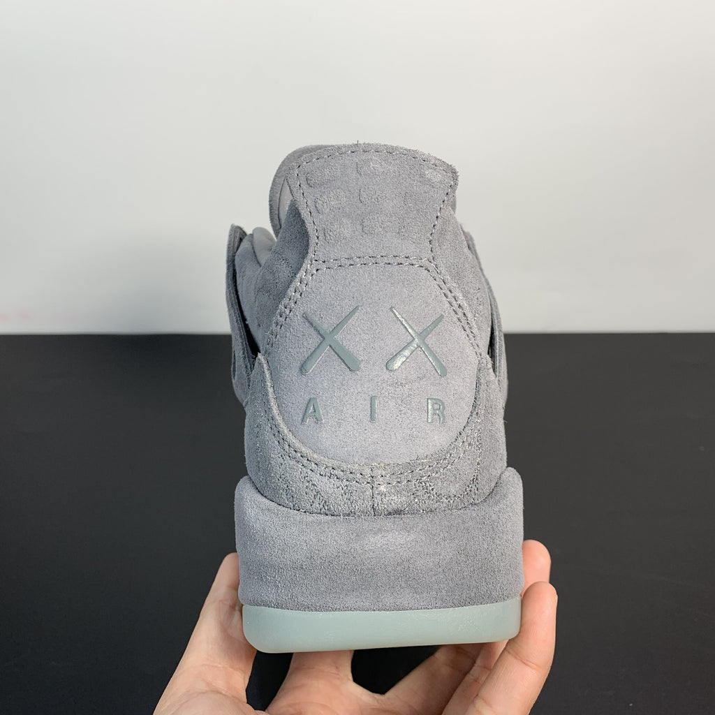 Air Jordan 4 Retro x KAWS "Cool Grey"