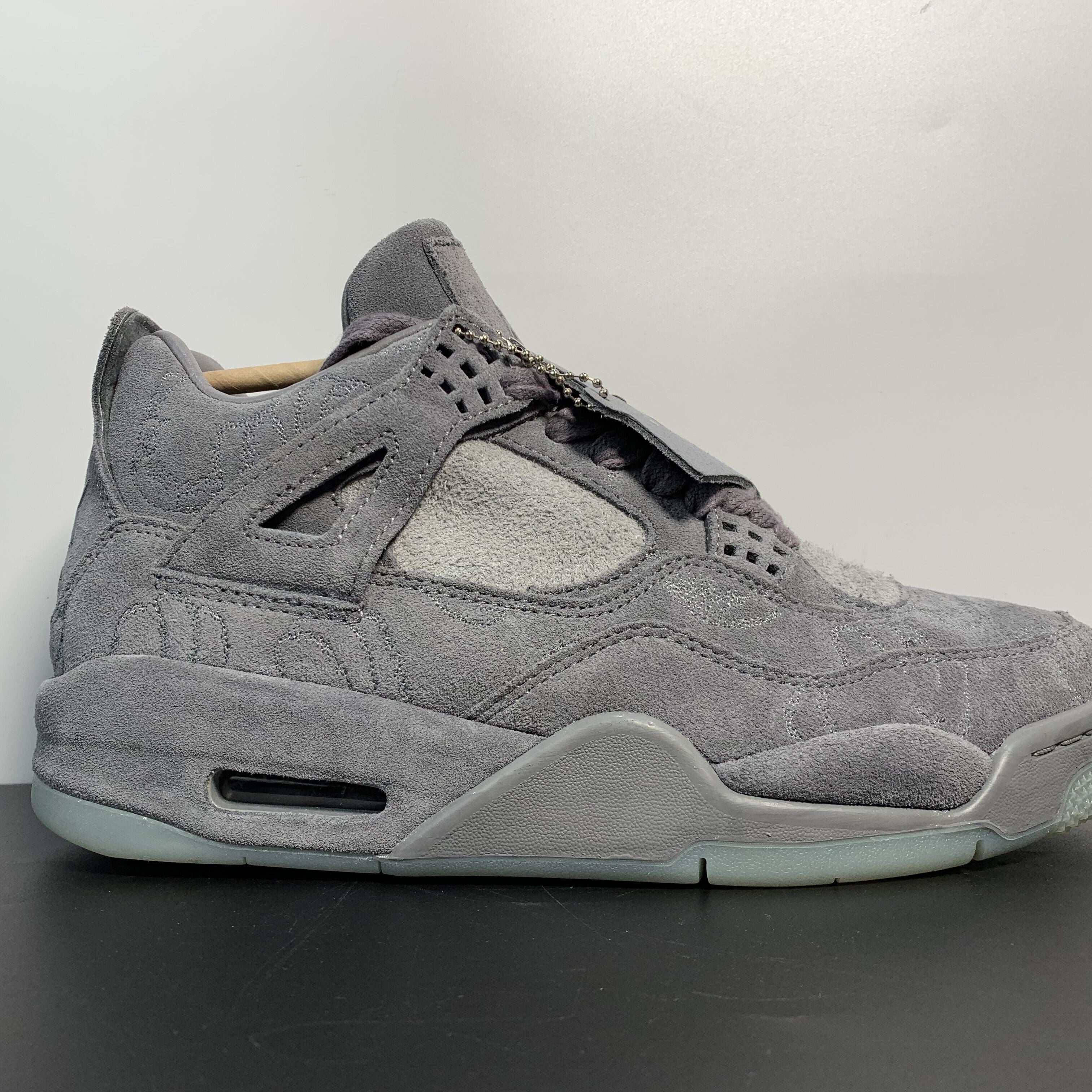 Air Jordan 4 Retro x KAWS "Cool Grey"