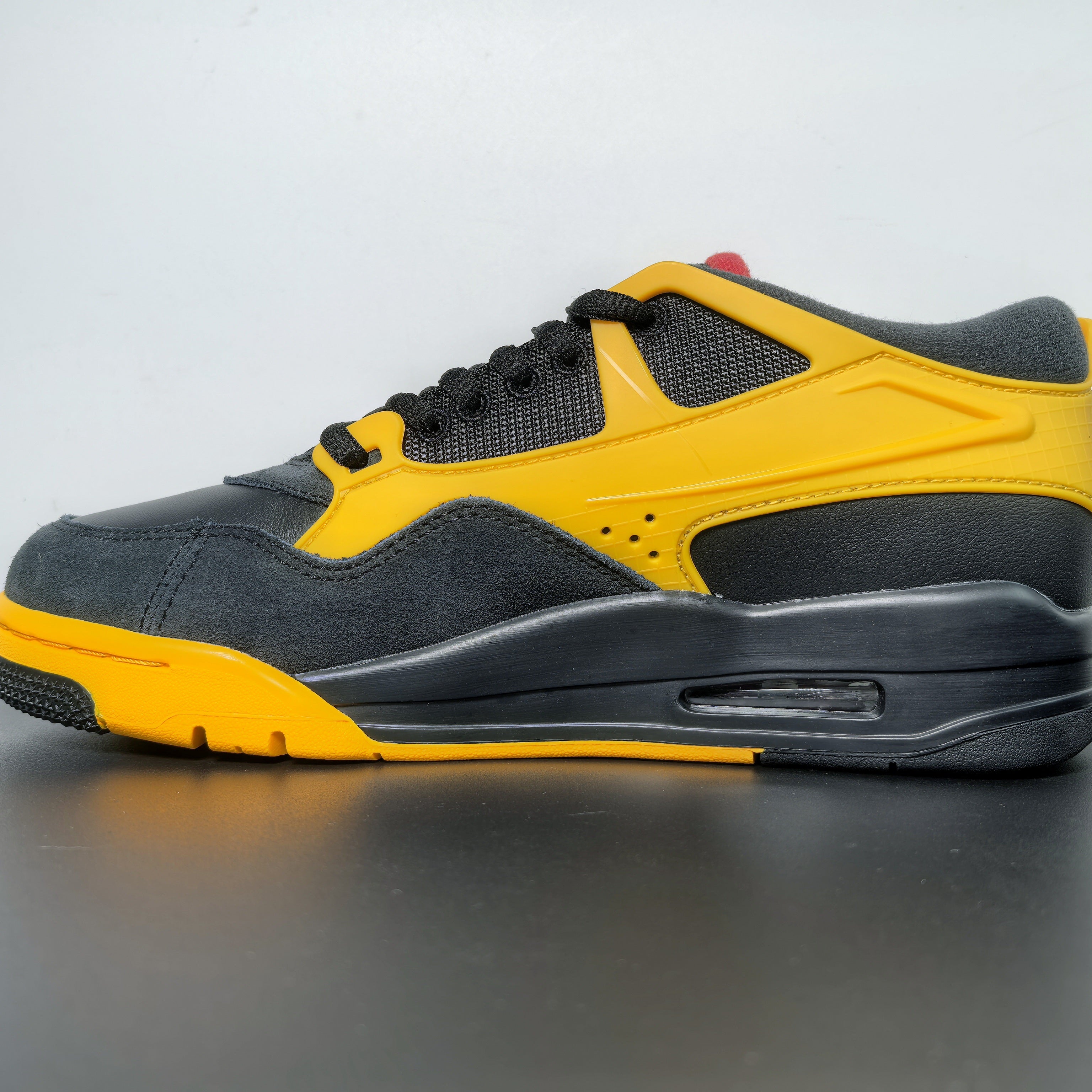 Nike Air Jordan 4 RM "Bruce Lee"