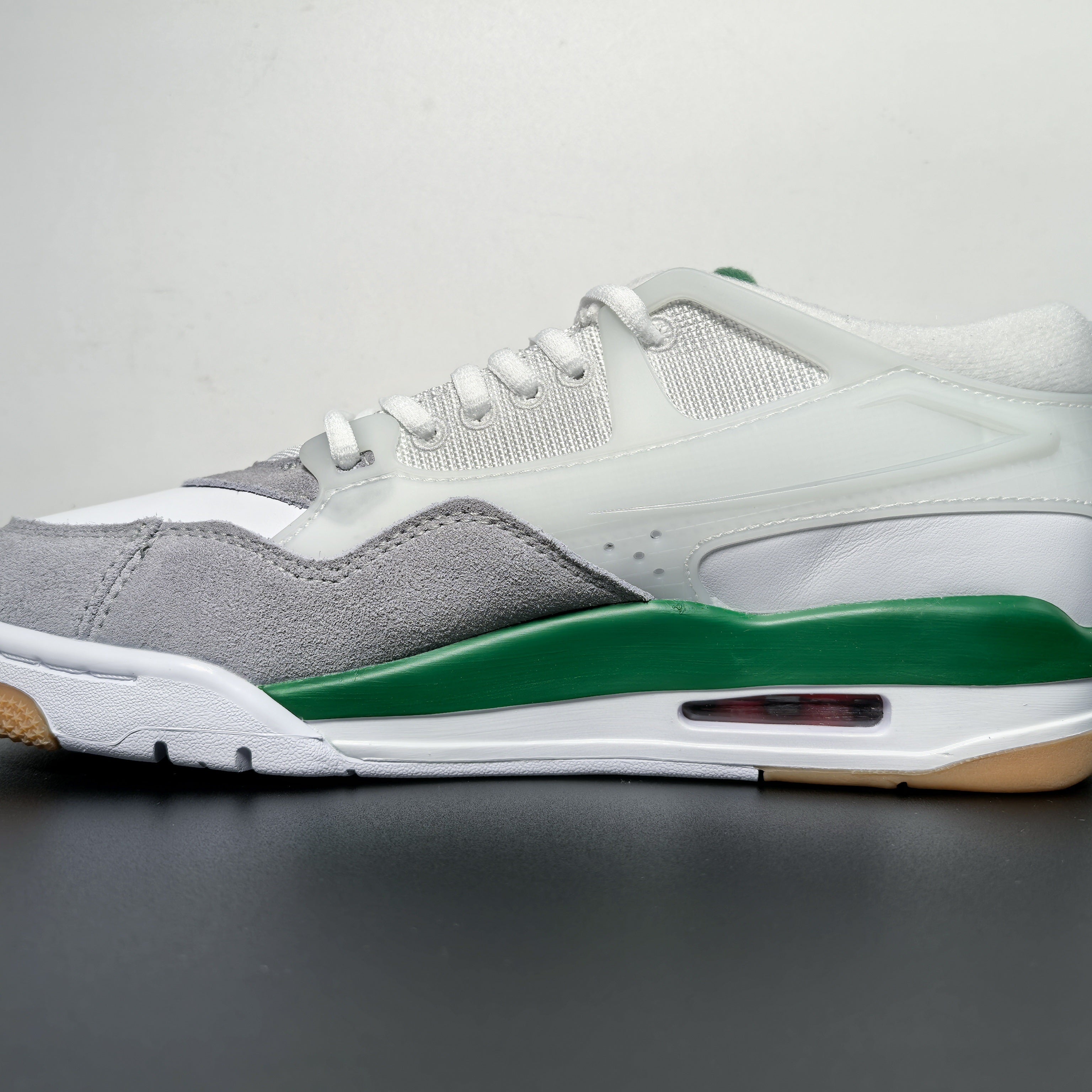 Air Jordan 4 RM “Pine Green”