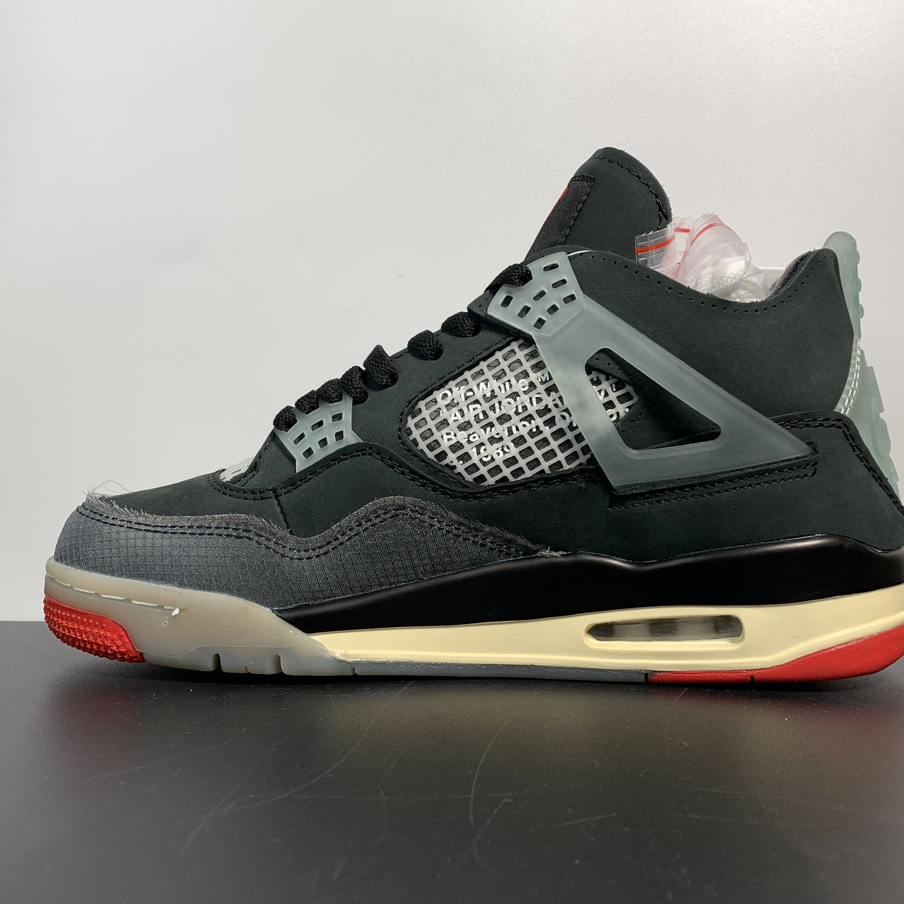 Off-White x Air Jordan 4 Retro "Bred"