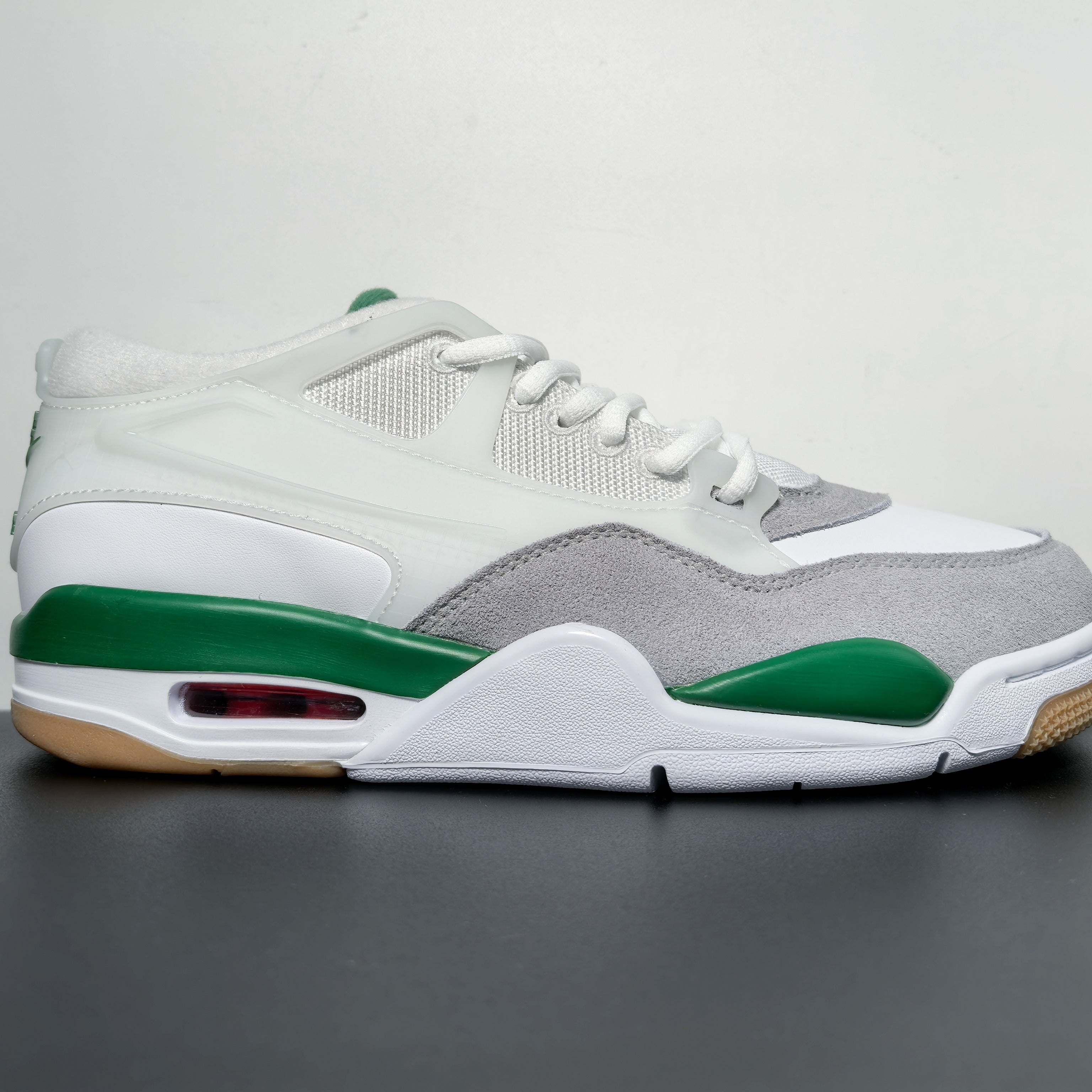 Air Jordan 4 RM “Pine Green”